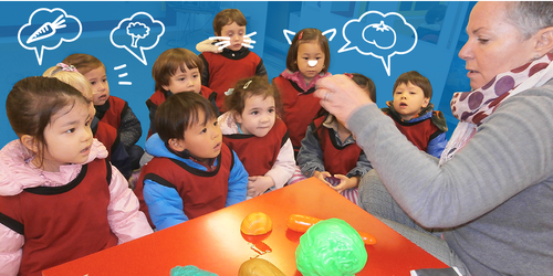 Children learning through visual aids at Ohana International School