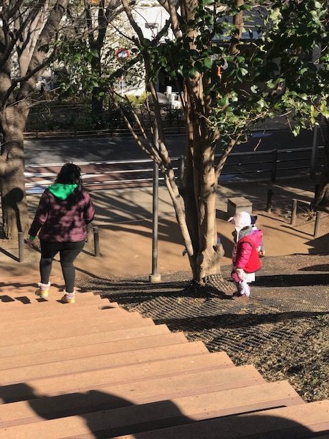 Kiki and a friend playing at Robot Park.